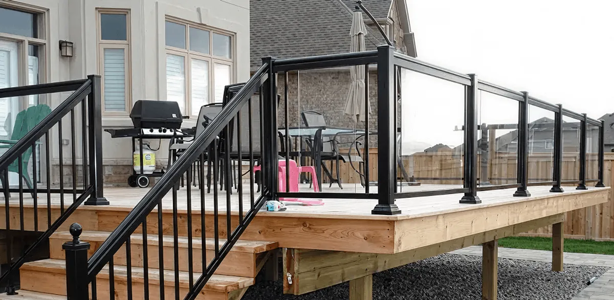 Handrail installation on a deck staircase for safety and code compliance in Chula Vista, CA